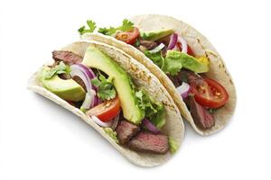 Delicious Steak Tacos with Avocado Tomato and Onion Ready to Eat photo