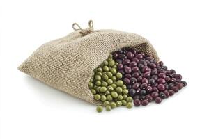 Beans Spilling From Burlap Sack Green Mung and Black Adzuki photo