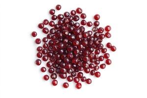 Pile of Small Red Berries on White Background Top-down View photo