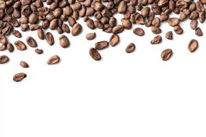 Scattered Cocoa Beans on a White Background for Ingredient Presentation photo