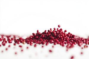 Adzuki Beans Falling on White Surface Creating Small Pile, Minimalist Food photo