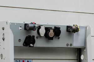 Multiple electrical connections are securely installed on a metal photo