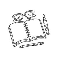 A notebook and glasses surrounded by stationery on a workspace vector