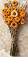 Bouquet of Yellow and Orange Marigold Flowers Tied with Twine on a Cream Textured Background photo