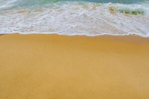 The calming sight of the beach offers a perfect backdrop for relaxation and tranquility. With soft, golden sand underfoot and gentle waves lapping at the shore, it creates an idyllic atmosphere. photo