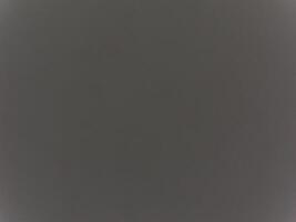 A gray background with no visible objects photo