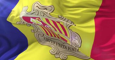 Andorran flag waving at wind in slow with blue sky, loop video