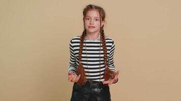 Displeased child girl gesturing hands with irritation blaming scolding for failure why this happened video