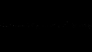 Glow spark bomb particles animation on black abstract background video