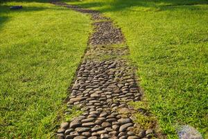 Photo of gravel walkaway path way for walking activities in garden park