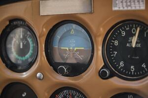 Control panel with round dashboard in airplane photo