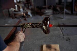 Crop craftsman making hookah base using jacks photo