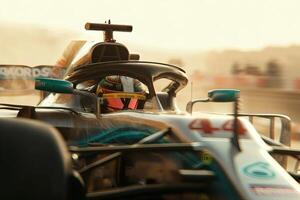 High-speed racing action with a driver focused on winning in a Formula 1 car during sunset photo