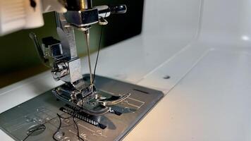 Crafting stitches with precision and care in a workshop photo