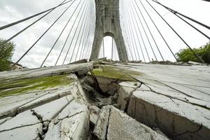 Cracked concrete reflects collapse. AI insights photo