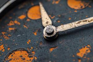 Close-Up of a Vintage Clock with Rustic Detailing. photo