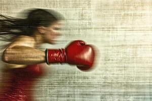 Powerful punches flow in a dynamic boxing training session. photo