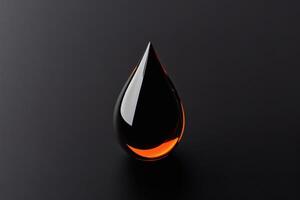 Captivating drop of amber liquid on dark backdrop. photo