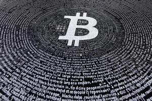 Artistic representation of bitcoin in a swirling pattern of digital text. photo