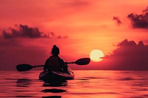 Paddling Into a Vibrant Sunset on Calm Waters. photo