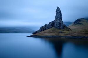 Mysterious monolith in calm waters photo