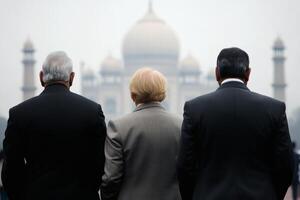 Three leaders gaze upon the majestic Taj Mahal, reflecting on history and unity during a hazy afternoon in Agra photo