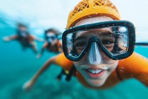 Exploring the underwater world with joy and laughter during a sunny day at the beach photo