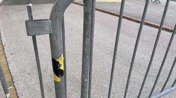 Closed gate marks the end of a vibrant event space photo