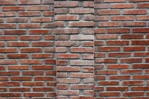 symmetrical red brick wall photo