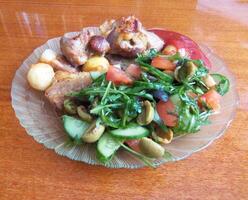 Fresh Homemade Meal with Roasted Meat and Salad photo