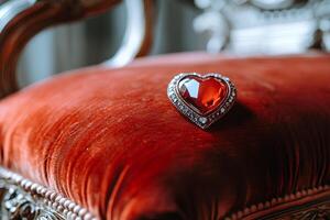 Elegant heart-shaped diamond ring displayed on a luxurious red pillow, symbolizing love and romance photo