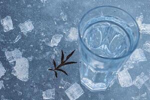 Beautiful transparent different pieces of ice on the ice surface. Pieces of ice filled with bubbles, a solid background. dishes, frozen water is clean. High quality photo