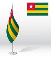 TOGO flag on flagpole for registration of solemn event, meeting foreign guests. National independence day of TOGO. Realistic 3D on white vector