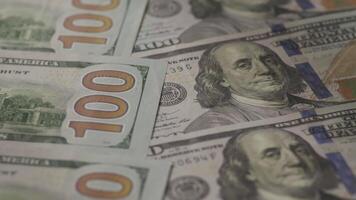 Stack of hundred-dollar bills in close-up view video
