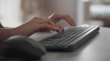 Close-up of hands typing on a keyboard video