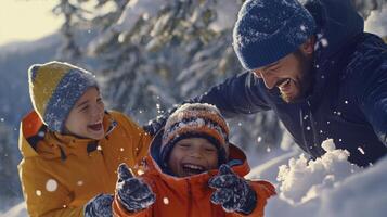 A man and two children are having fun in the snow photo