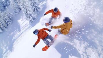 Two snowboarders are going down a snowy slope photo