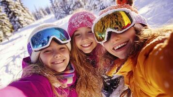 Three girls taking a selfie in the snow photo