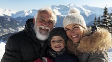 An older man and woman with a young boy in the snow photo