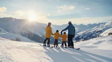 A family is standing on a snowy slope with skis photo