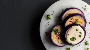 A plate with sliced eggplant on it photo