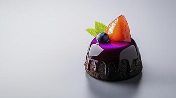 A dessert with purple and blue icing photo