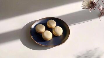 A plate with four eggs on it and a flower photo