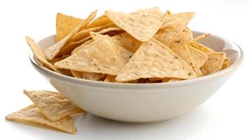 Delicious triangular tortilla chips perfect for snacking and entertaining. photo