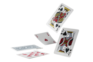 Playing cards falling on table, featuring hearts and spades suits, creating dynamic scene png