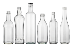 Clear glass bottles in various shapes and sizes arranged together png