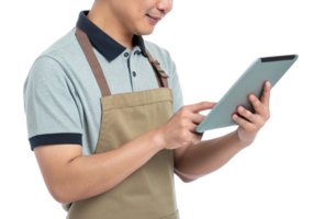 smiling man in apron uses tablet, blending food and technology in modern setting png