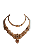 Elegant gold necklace set with intricate designs and sparkling gemstones, perfect for formal events and special occasions png