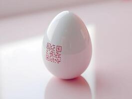white ceramic egg with a red QR code prominently displayed on its side, resting on a pristine white surface photo