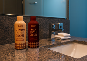 Shampoo and soap bottle mockups sit on a bathroom counter next to a sink psd